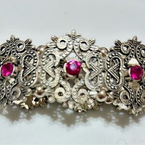 Ornate Silver Bracelet with Pink Accents